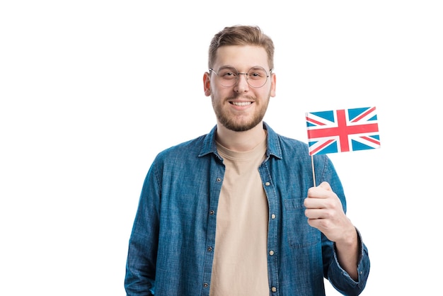 Patriotic young male holding national flag