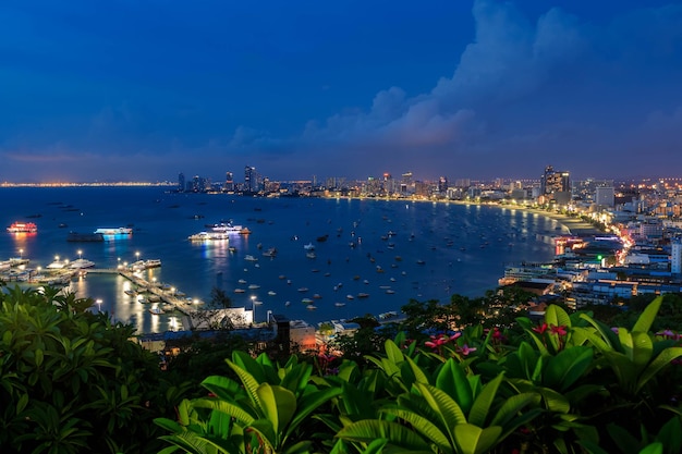 Pattaya bay and Bali Hai Pier from Phra Tamnak Mountain viewpoint during twilight Chonburi Thailand panorama