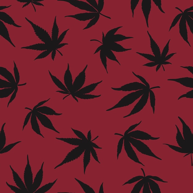 Pattern of black hemp on a red background Marijuana pattern on a red background