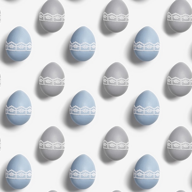 Pattern from decorated Easter eggs pastel colors green blue gray beige on white background Happy