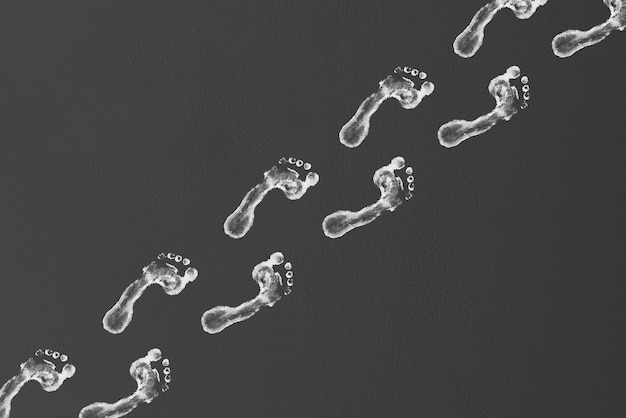 A pattern of human footsteps print on the wall