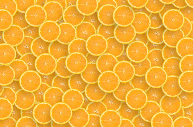 Pattern of orange citrus slices. Citrus flat lay