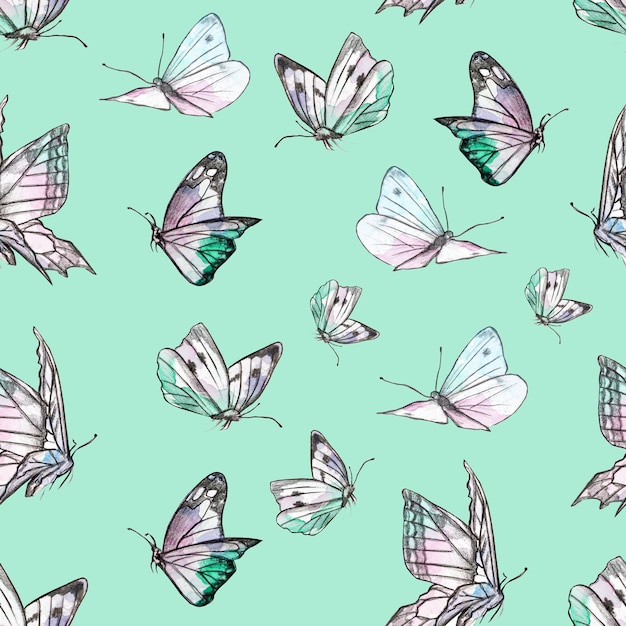 pattern of watercolor butterflies on a green background