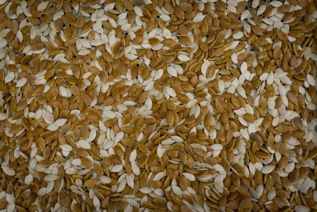 Pattern of yellow and white pumpkin seeds