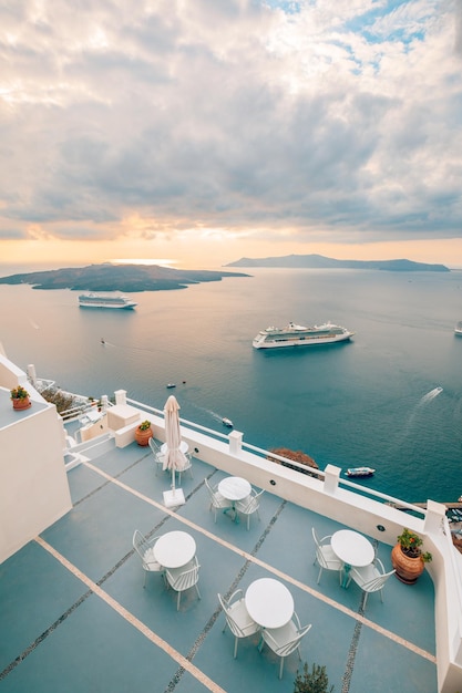 Peaceful evening view of Santorini island Picturesque spring sunset on the famous Greek resort Fira