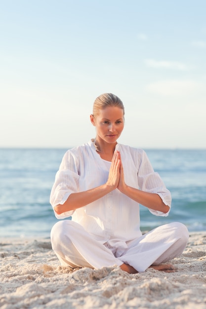 Peaceful woman practicing yoga 