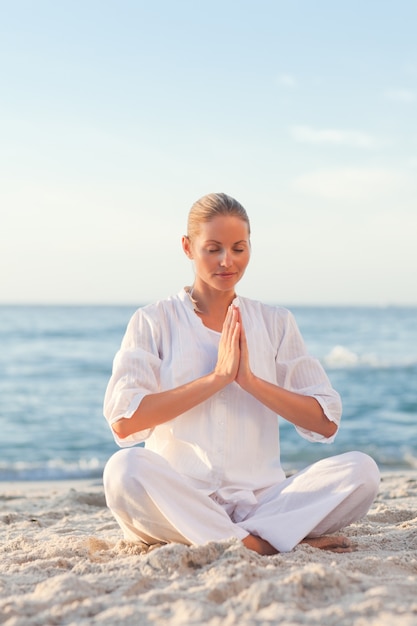 Peaceful woman practicing yoga 