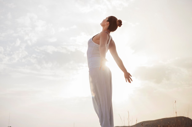 Peaceful woman taking a deep breath