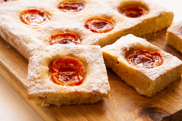 Peach cake made with a recipe with yogurt and fresh fruit.