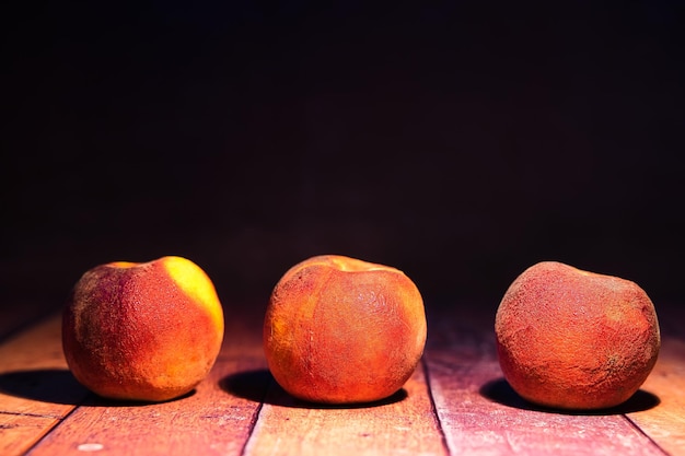 Peach o wooden background world food day