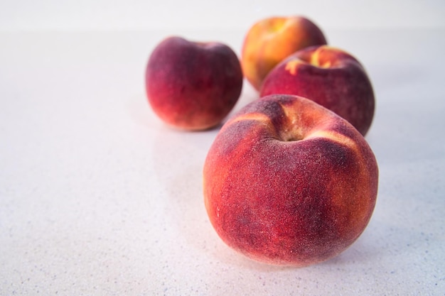 Peach on white background world food day