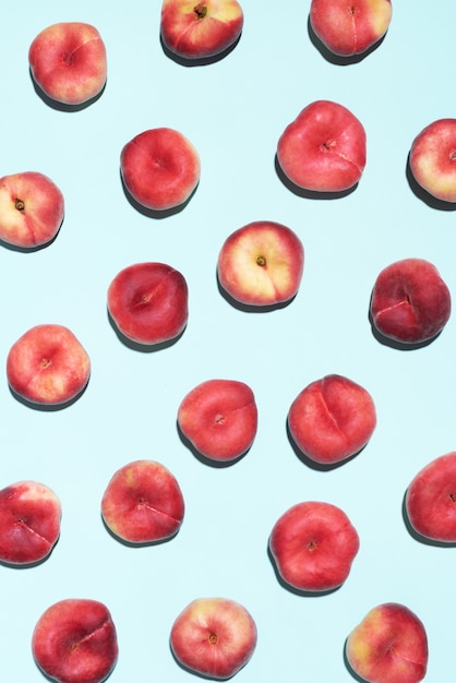 Peaches pattern on pastel blue background