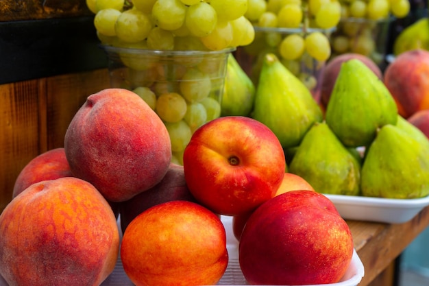 Peachs figs and other fruits on a street market