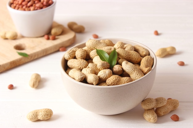 Peanuts on a light background close-up. High quality photo