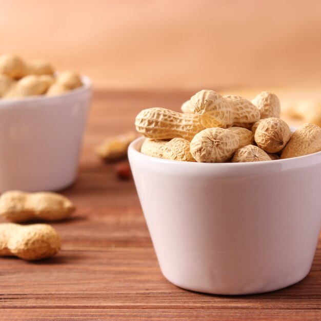 Peanuts on a light background close-up. High quality photo