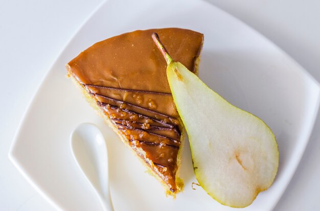 Pear flavored cake on a white plate