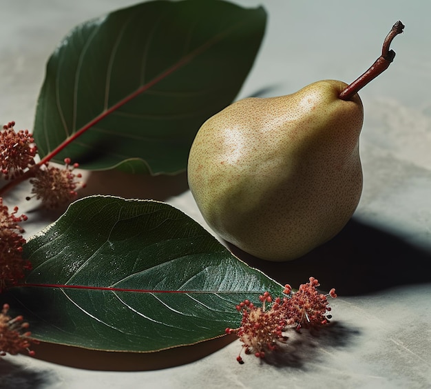 A pear and leaves are on a table with a pear.