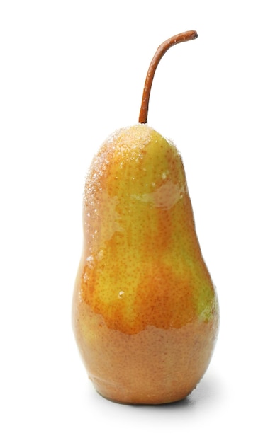 Pear with caramel sauce on white background