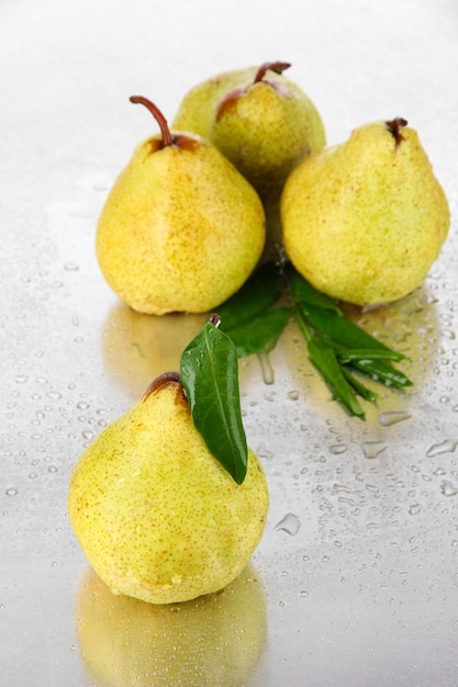 Pears on metal background