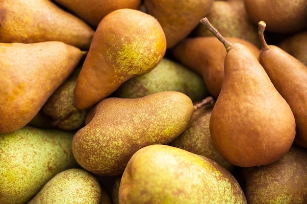 Pears. Natural background of fresh juicy brown ripe pears. Close Up of pears in box.