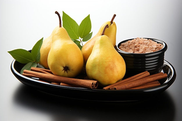 Photo pears with cinnamon and cloves on a slate plate