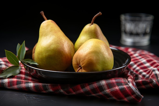 Photo pears with cinnamon and cloves on a slate plate