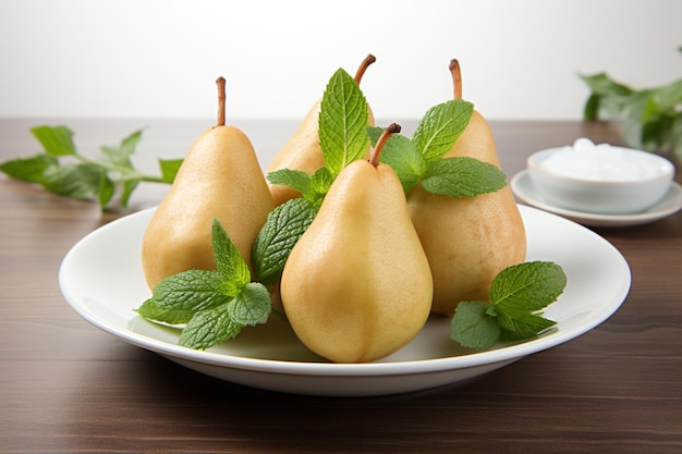 Pears with Fresh Mint Leaves on a White Plate