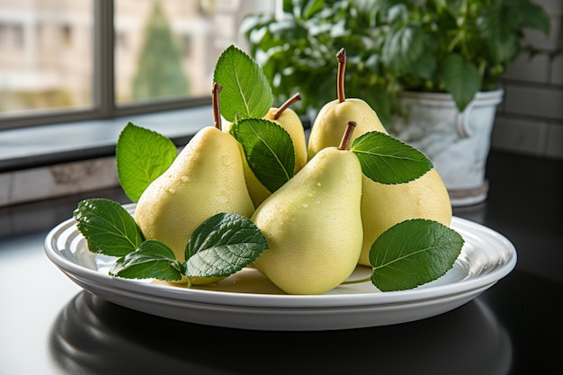 Photo pears with fresh mint on a white ceramic plate