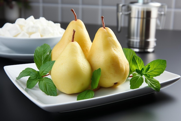 Photo pears with fresh mint on a white ceramic plate