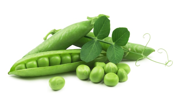 Peas isolated. Fresh green peas and pea kernels with leaves.