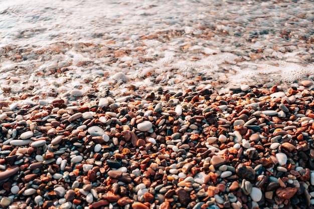 Pebbles on the beach texture of the sea shore the adriatic sea