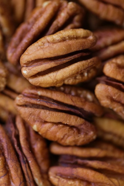 Pecan nut close-up . Healthy fats.