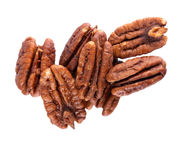 Pecan nuts isolated on white background Shelled pecan Clipping path Top view