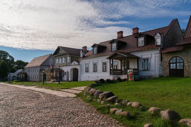 Pechorskaya Street with old traditional merchant estates Izborsk Pskov region Russia