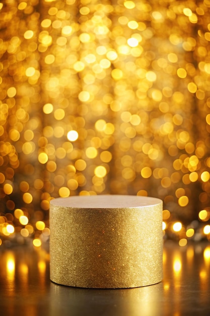 Photo pedestal for product display presentation in golden blurry bokeh festive showcase