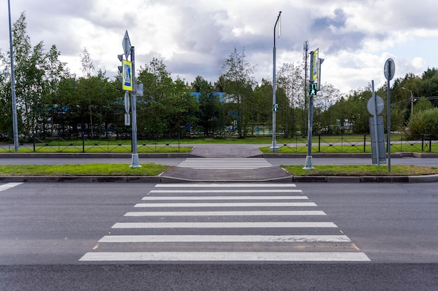 Pedestrian crossing at a city intersection Zebra traffic walk way in the city