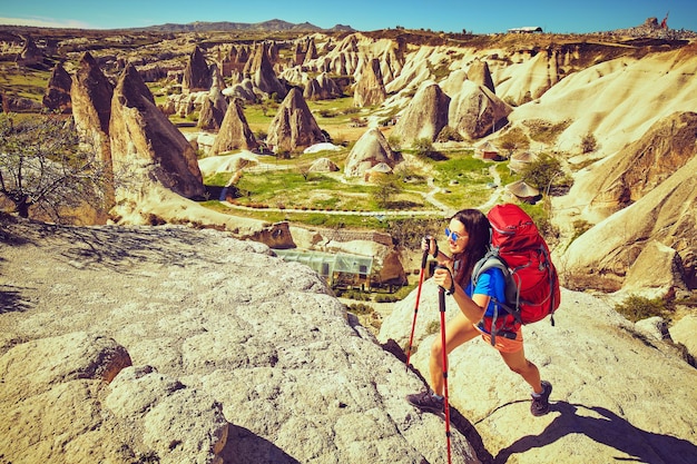 Pedestrian tourism, people travel with backpacks, in the open air.