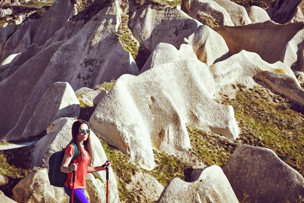 Pedestrian tourism, people travel with backpacks, in the open air.