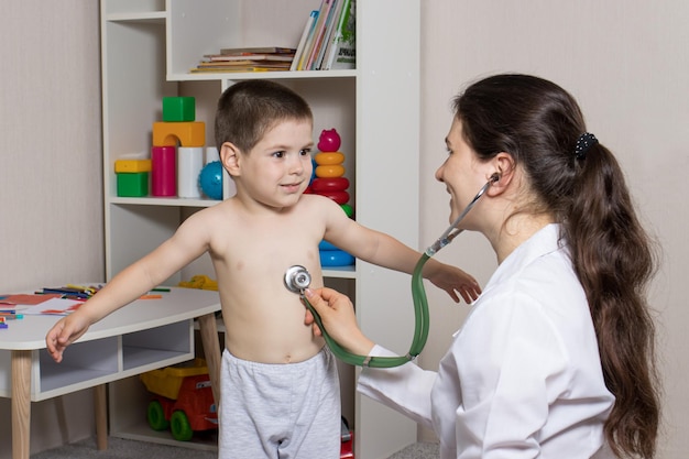 Pediatric examination of a child with a stethoscope