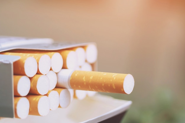 peel it off Cigarette pack prepare smoking a cigarette. Packing line up.