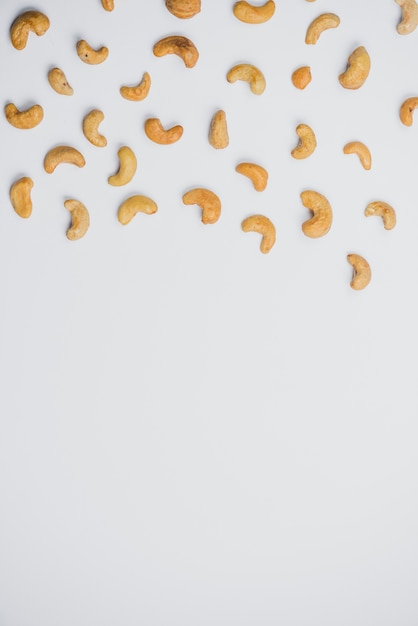 Peeled cashew on white