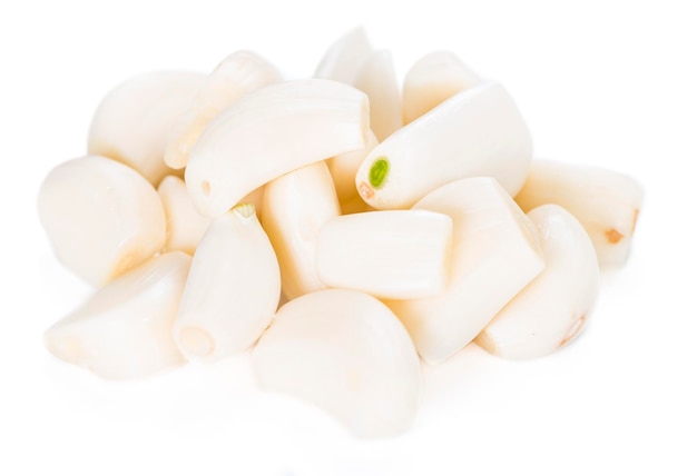 Peeled Garlic on white background