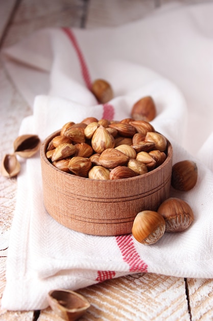 Peeled hazelnuts on the table close up