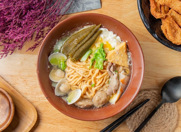 Peeled Pepper Noodles served in a dish isolated on table top view of chinese food