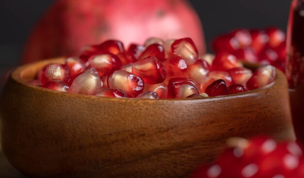 peeled red ripe pomegranate with juicy grains red pomegranate without peel with lots of sweet seeds