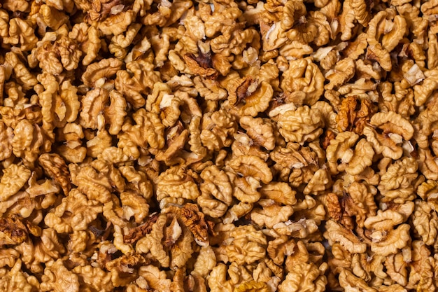 Peeled walnuts background