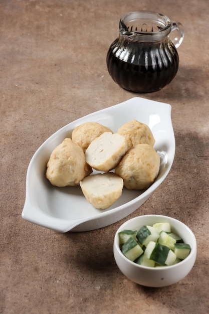 Pempek Adaan or Pempek Bulat is round shape of fish cake from Palembang, served with cuko sauce.