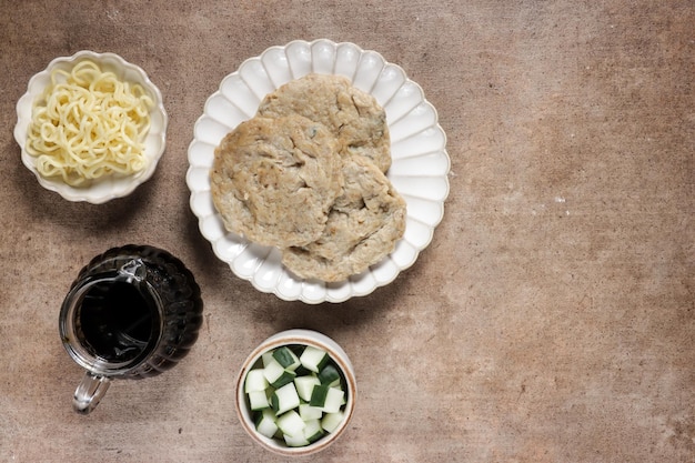 Pempek Kulit Rebus is a steamed skin fish cake from Palembang served with cuko.