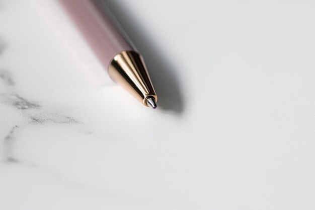 Pen on marble background luxury stationery and business brand