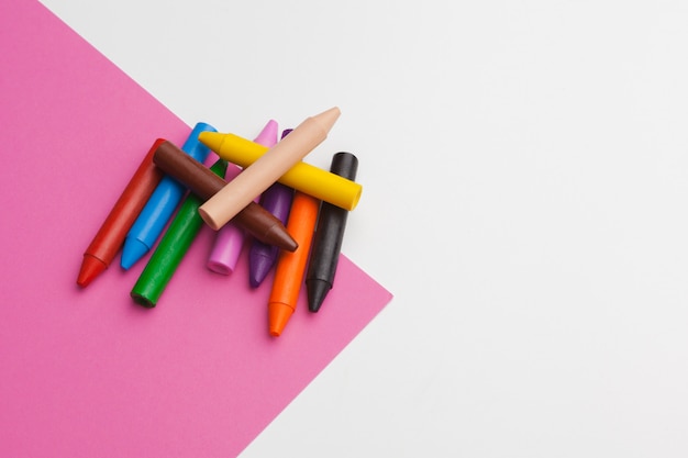 Photo pencil crayon on a bright pink background. art concept